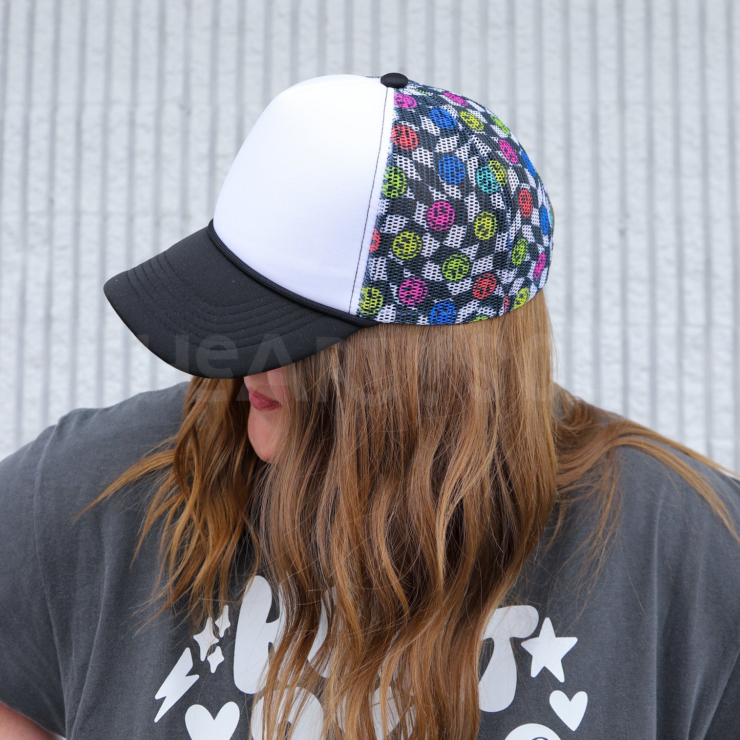WAVY CHECKER SMILEY TRUCKER HAT