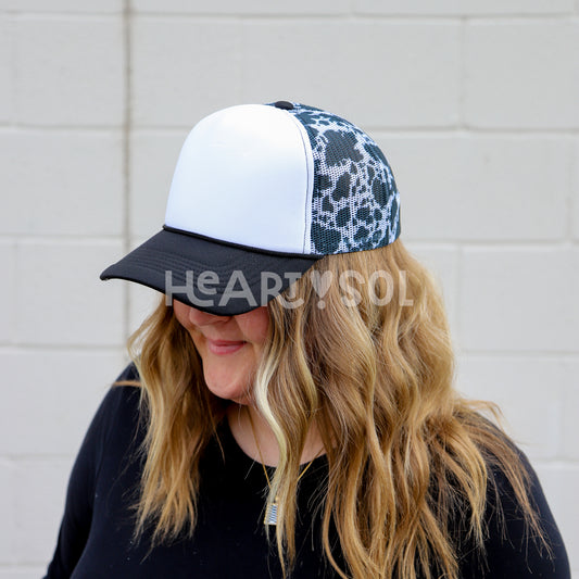 COW PRINT TRUCKER HAT